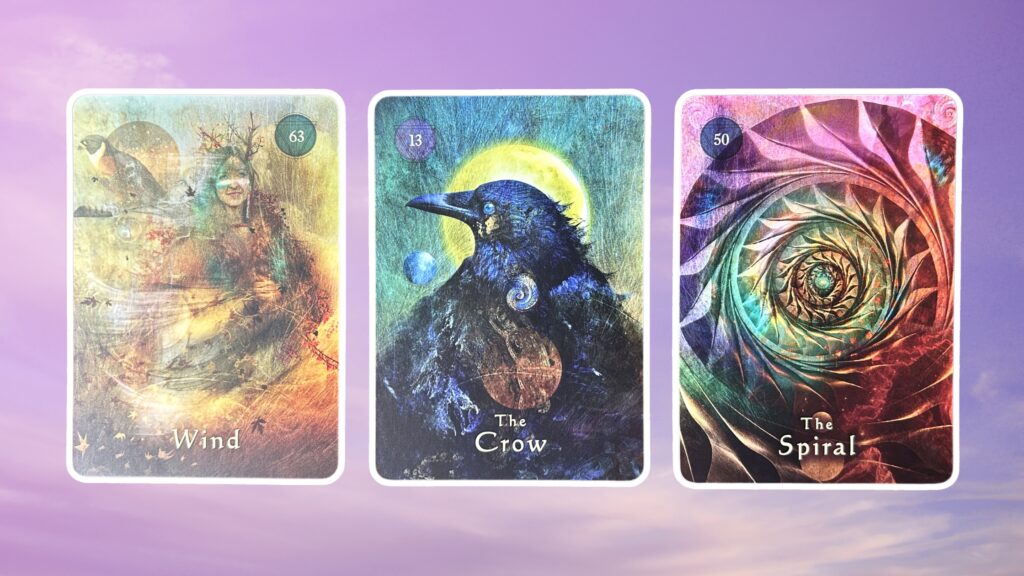 Three cards from the Mystical Shaman Oracle deck: pile 1 - Wind, pile 2 - The Crow, pile 3 - The Spiral