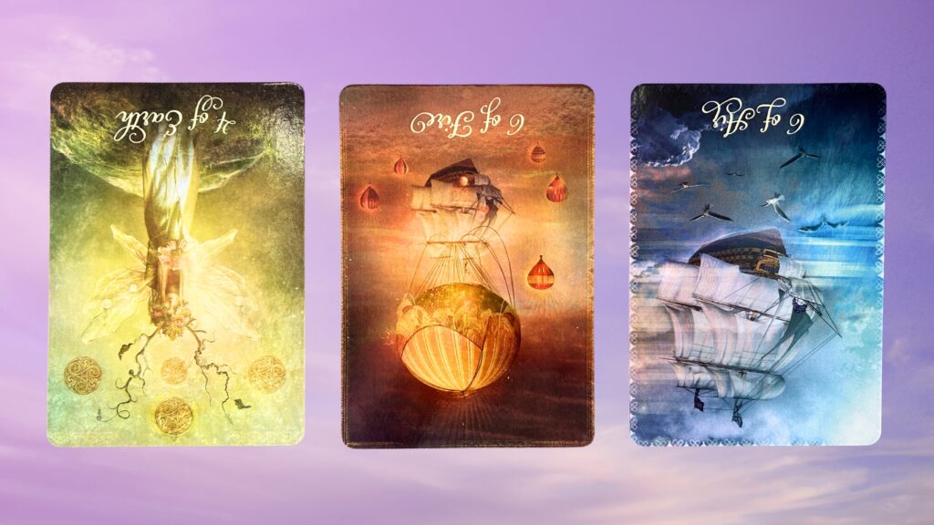 Cards from the Good Tarot deck: Four of Earth, Six of Fire, and Six of Air