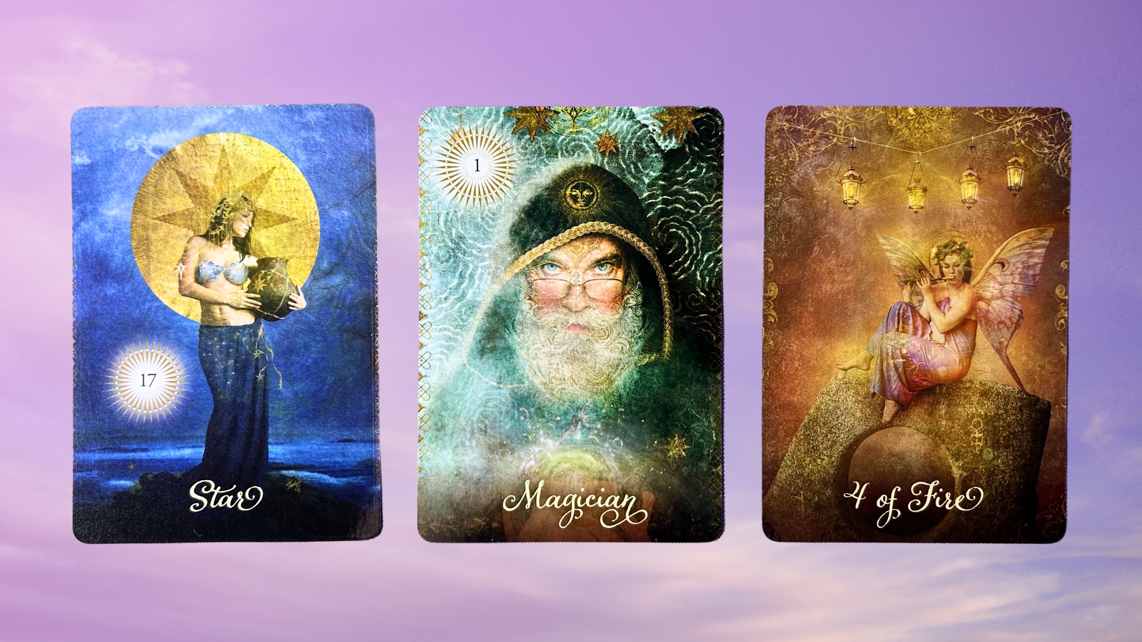 Cards from the Good Tarot deck: Star, Magician, and Four of Fire