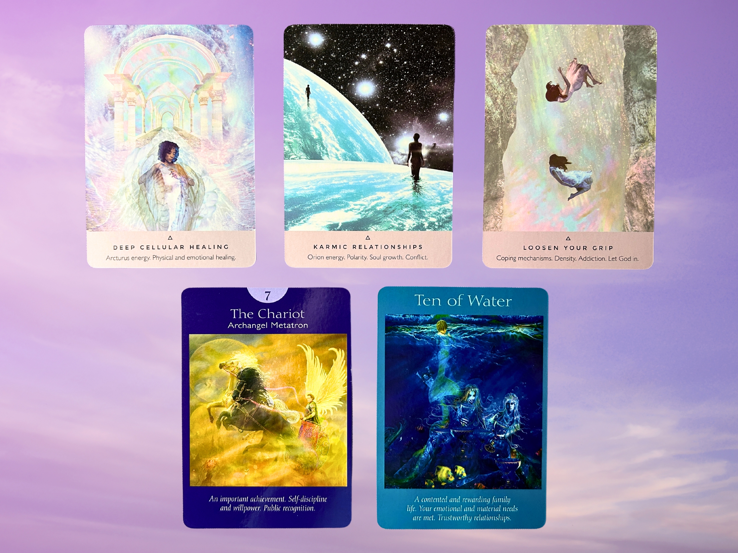 Cards from the Starseed Oracle and the Angel Tarot decks