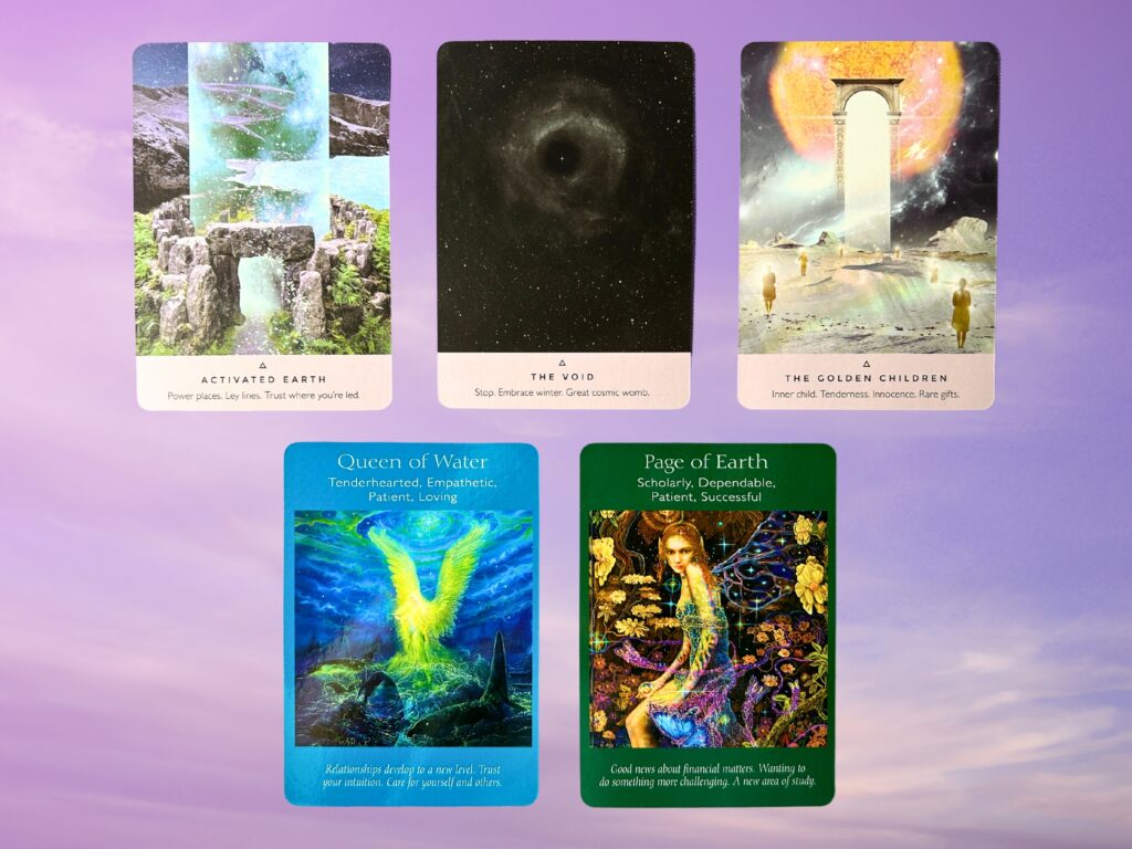 Cards from the Starseed Oracle and the Angel Tarot decks