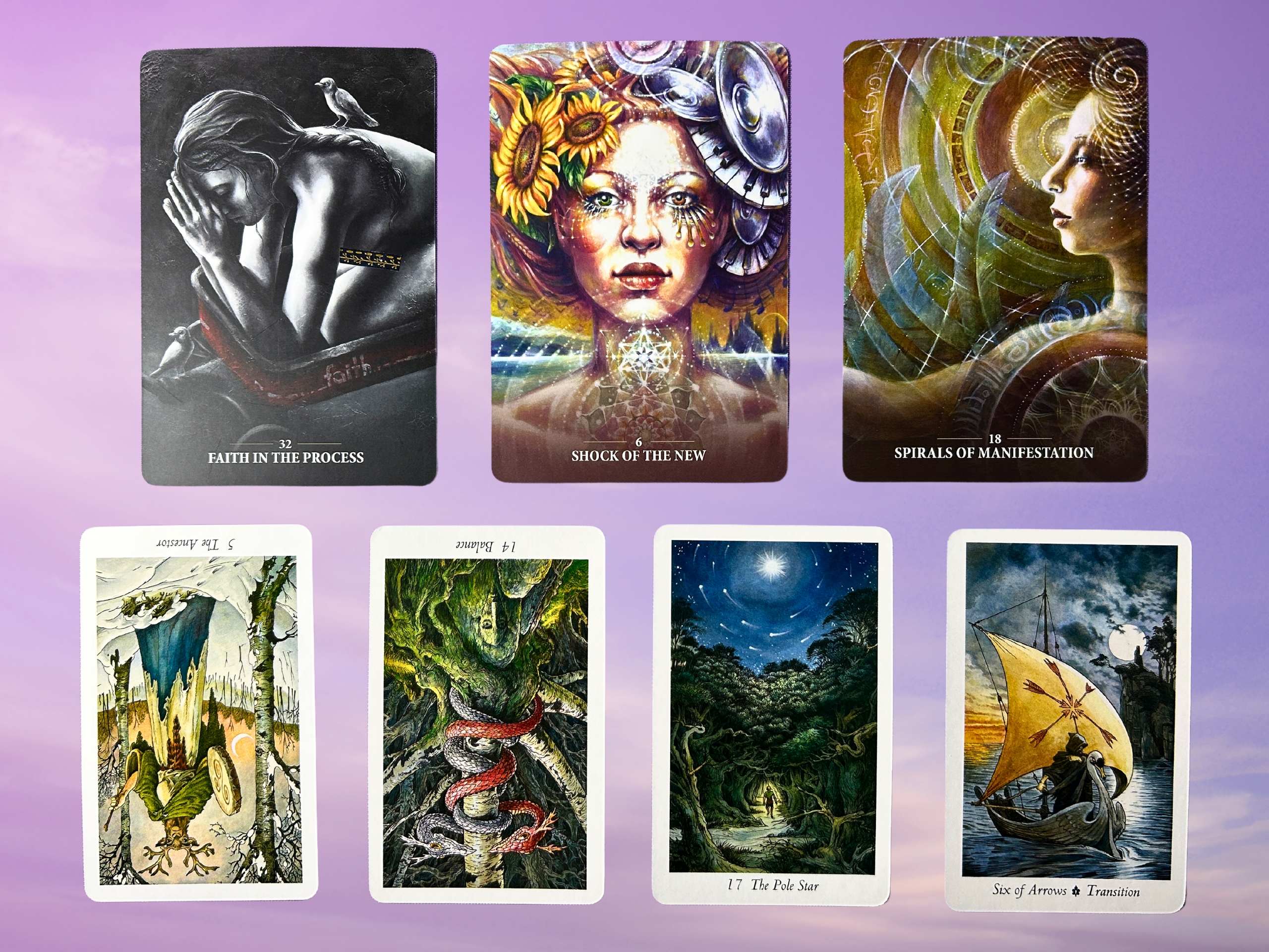 Cards from the Sacred Rebel Oracle and the Wildwood Tarot decks