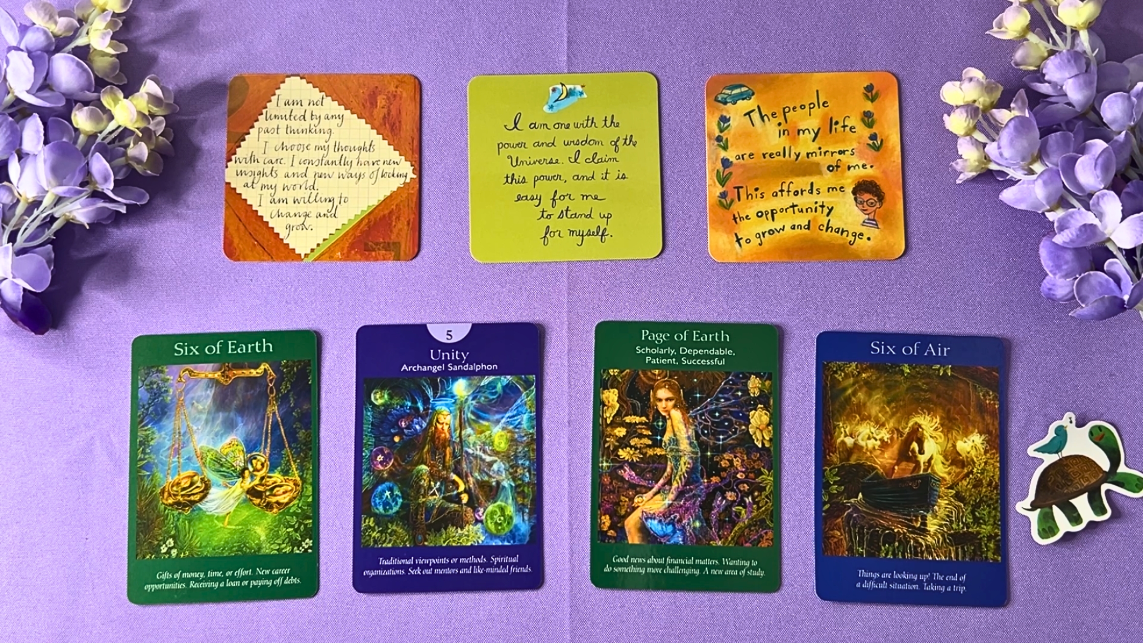 Cards from the Power Thought Oracle and the Angel Tarot decks