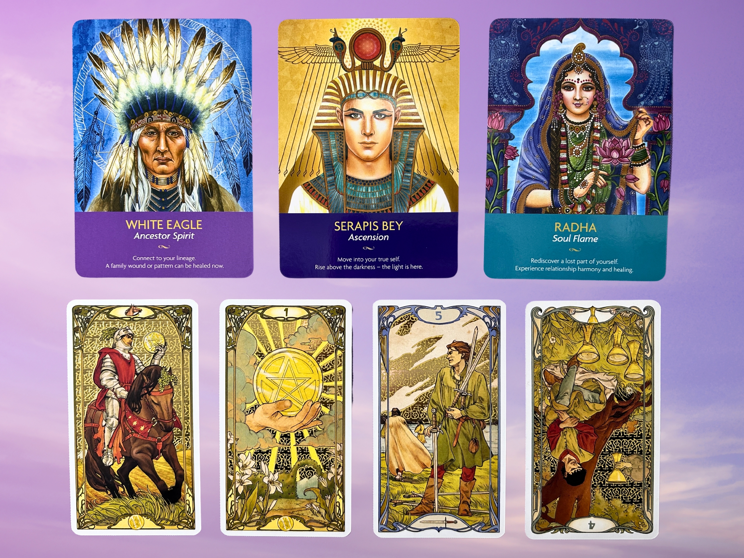 Cards from the Keepers of the Light Oracle and the Golden Art Nouveau Tarot deck