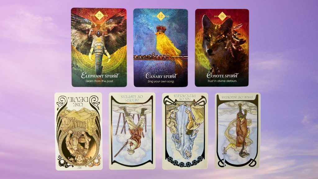 Cards from the Animal Spirit Oracle and the Ethereal Visions Illuminated Tarot deck
