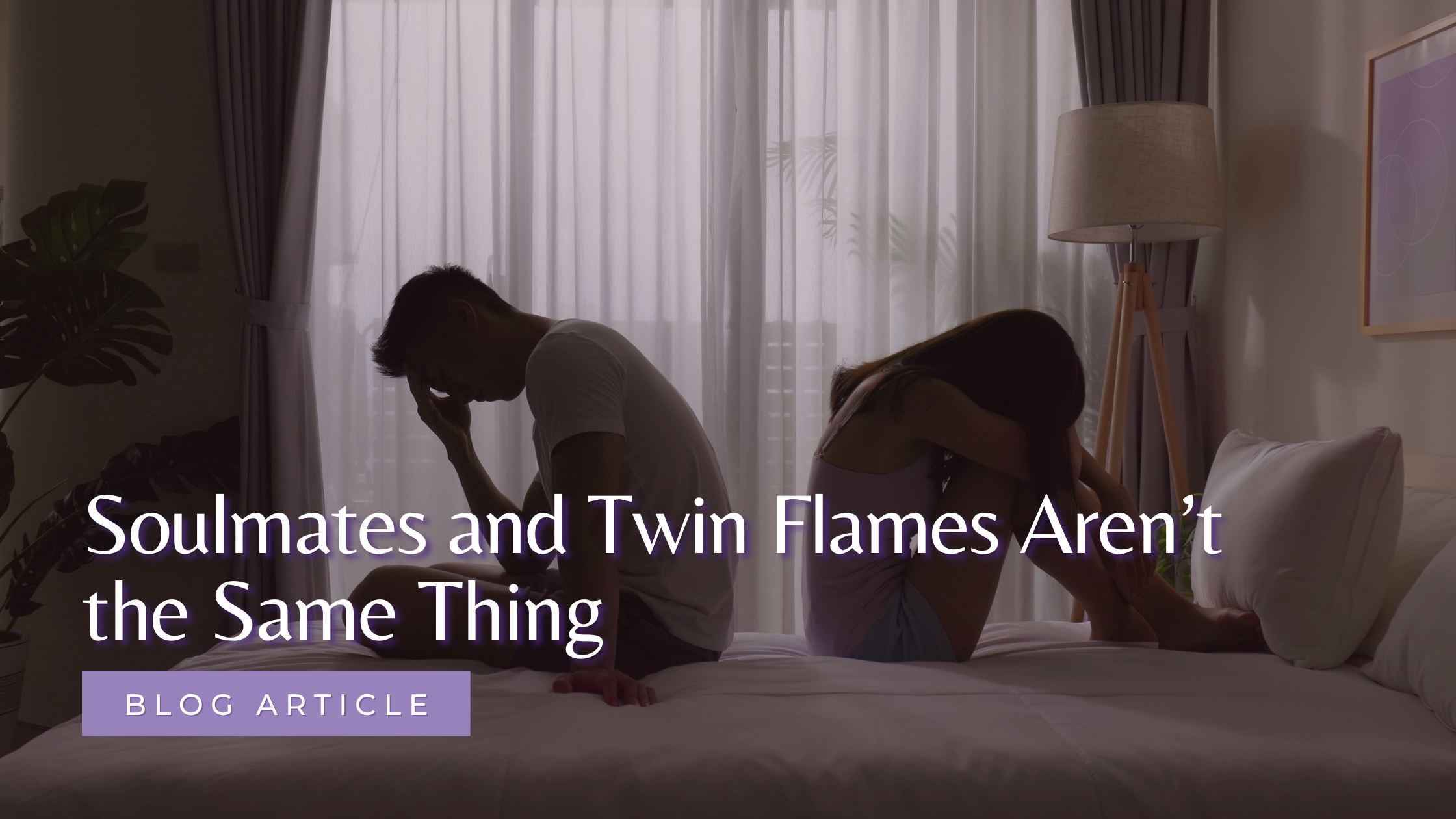 A couple looking away from each other on the bed