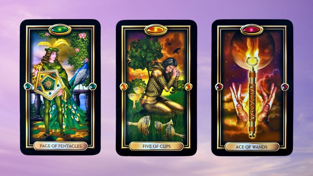 Cards from the Gilded Tarot: Page of Pentacles, Five of Cups, and Ace of Wands