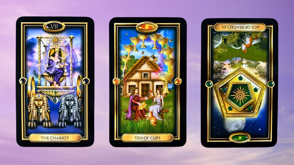 Cards from the Gilded Tarot: The Chariot, Ten of Cups, and Ace of Pentacles