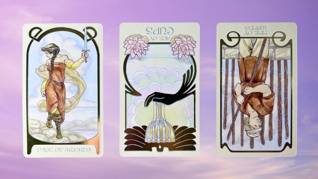 Cards from the Ethereal Visions Illuminated Tarot deck: page of swords, ace of cups, and nine of wands