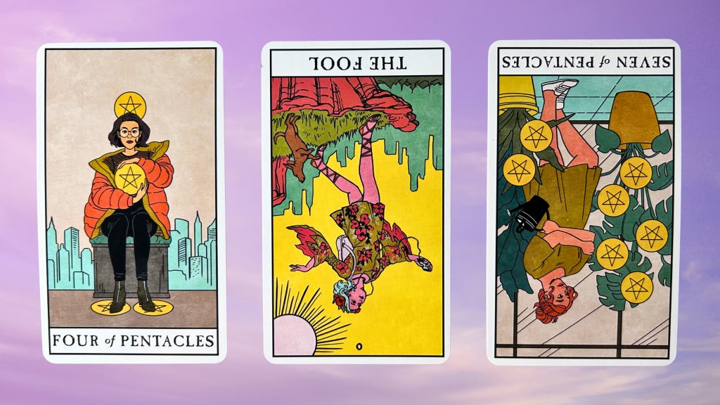 Cards from the Modern Witch Tarot deck: four of pentacles, the fool, and seven of pentacles